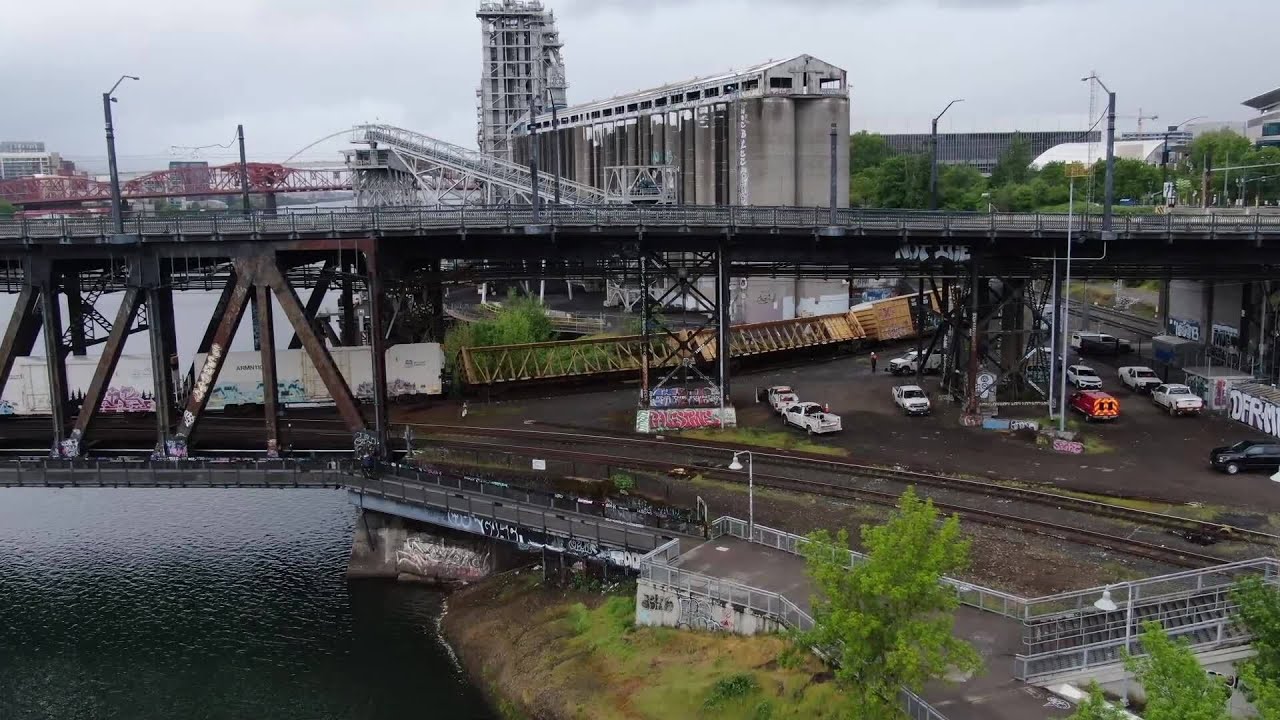 Drone footage reveals extent of Steel Bridge train derailment