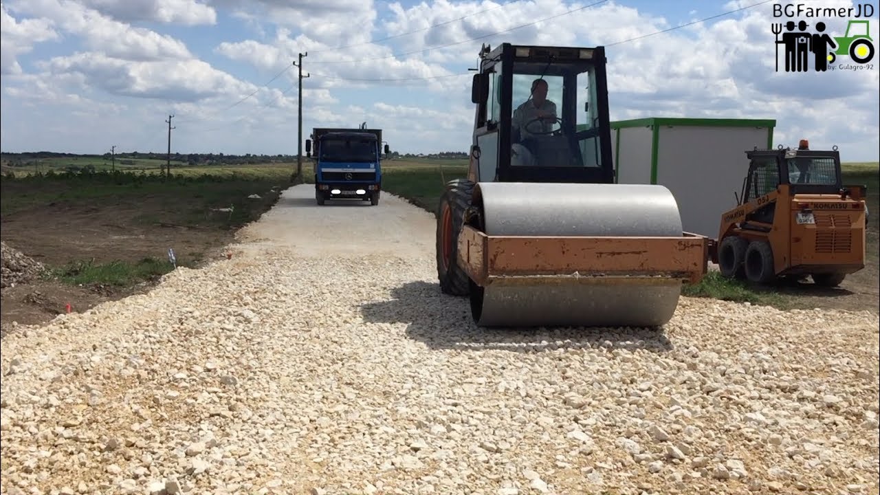 Building a Road: Laying, Alignment, rolling of road pavement from Crushed Gravel