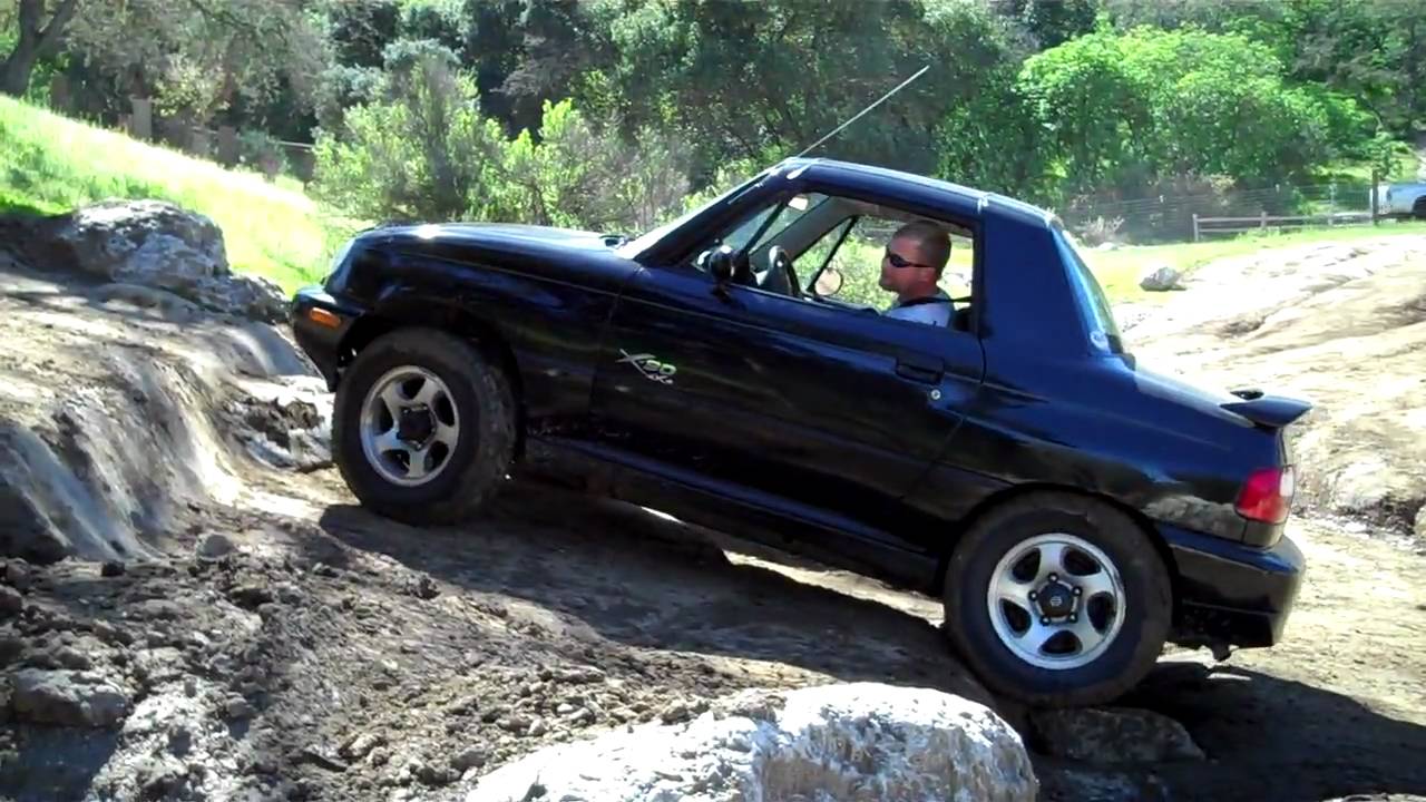 Suzuki X90 conquering the Stair Steps at Hollister Hills
