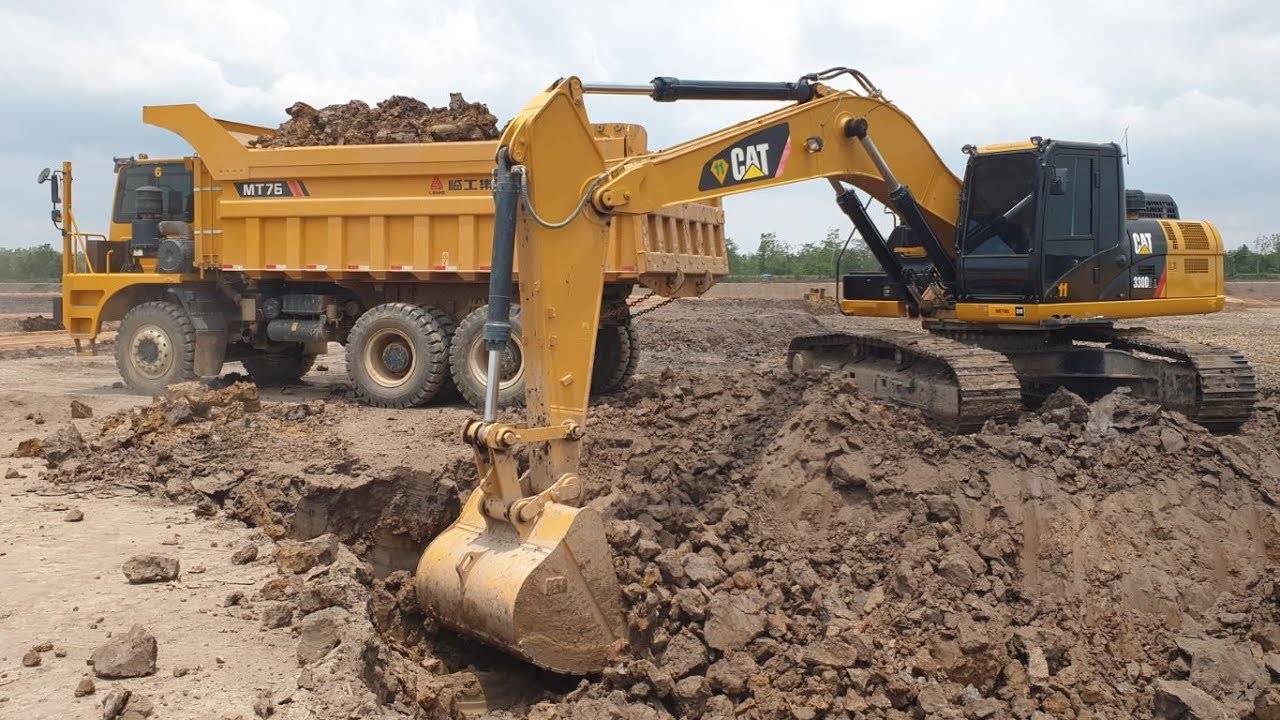 ใหญ่สมน้ำสมเนื้อ รถขุด CAT 330D2 L รถขน LGMG MT76 งานใหญ่ใช้รถเหมืองครับ