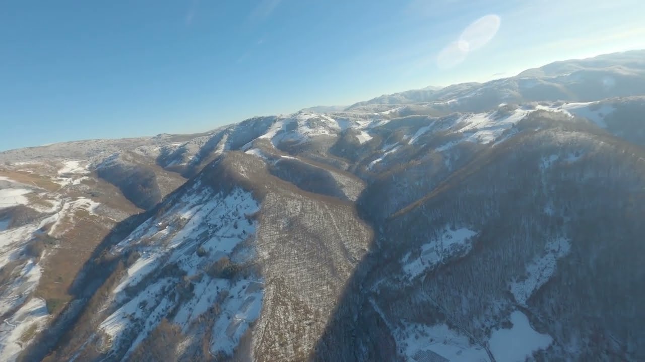 Flying through frozen village of Osonica with Talon GT Rebel