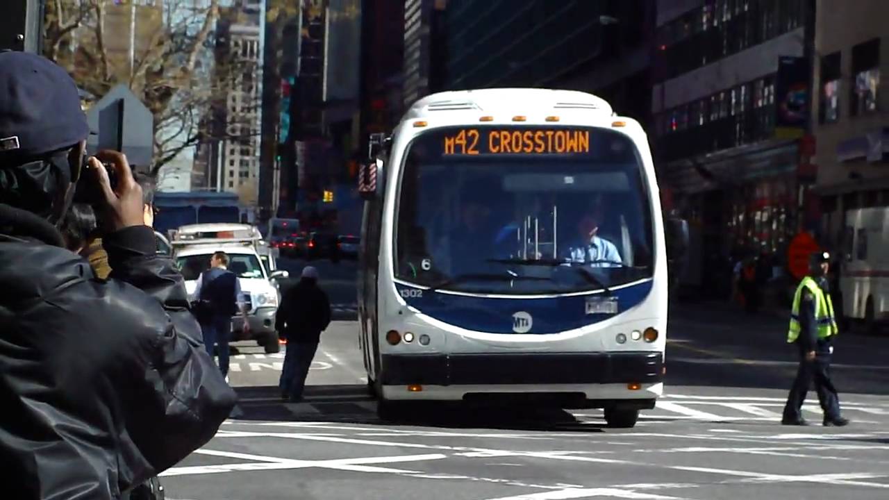 MTA New York City Bus 2009 Designline Eco-Saver IV Hybrid 1302 On The M42 @ 42nd St & 9th Ave