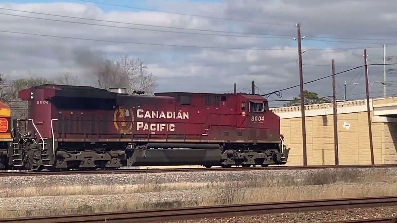 CPKC manifest freight passing control point tower 17