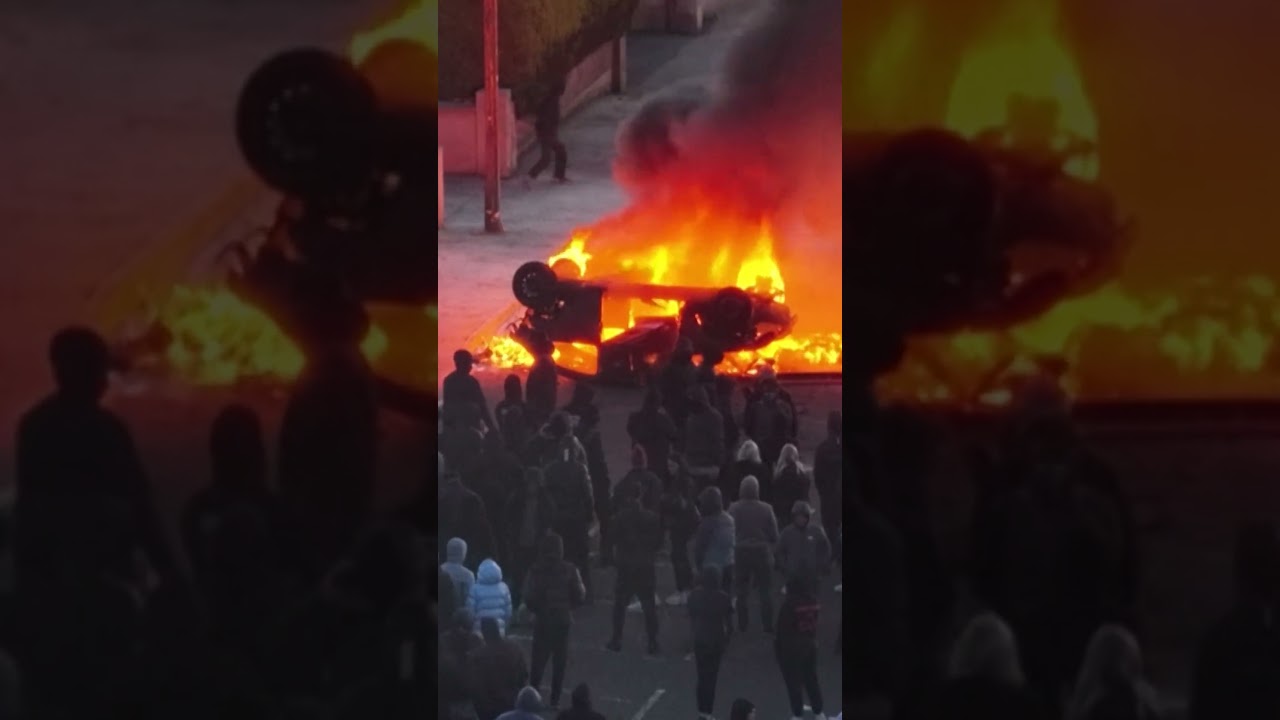 Car Ablaze Amid Anti-Immigration Violence in Belfast After Victim Loses Eye in Knife Attack #shorts