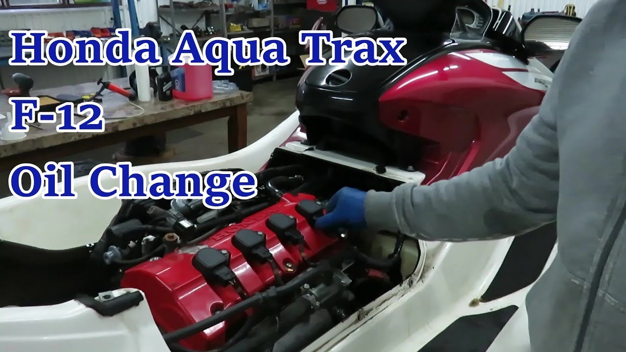 Oil Change and Maintenance of 2006 Honda Aqua Trax F-12