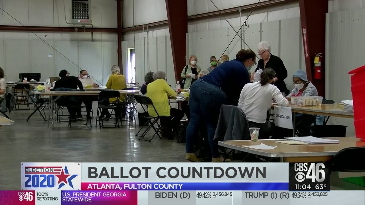 Georgia poll workers race to complete count