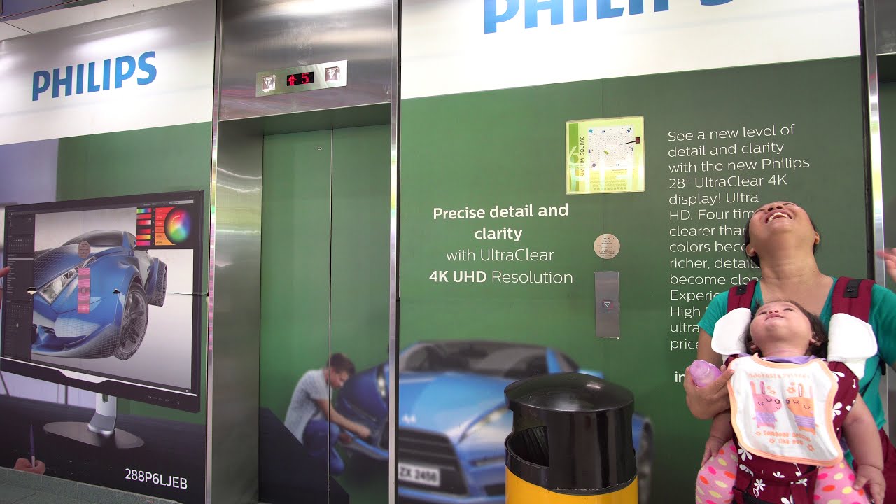 Singapore, Sim Lim Square, HITACHI elevator - going down