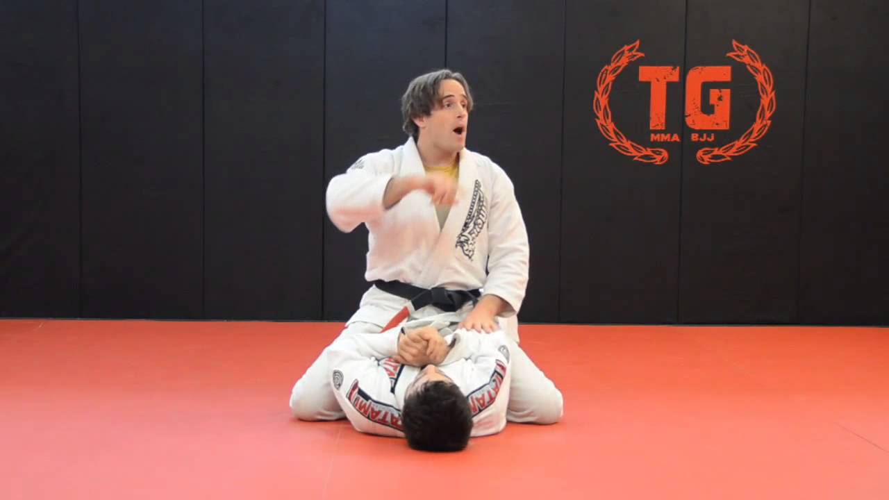 MMA In NJ- Training Grounds Jiu-Jitsu & MMA shows a keylock detail from the mount