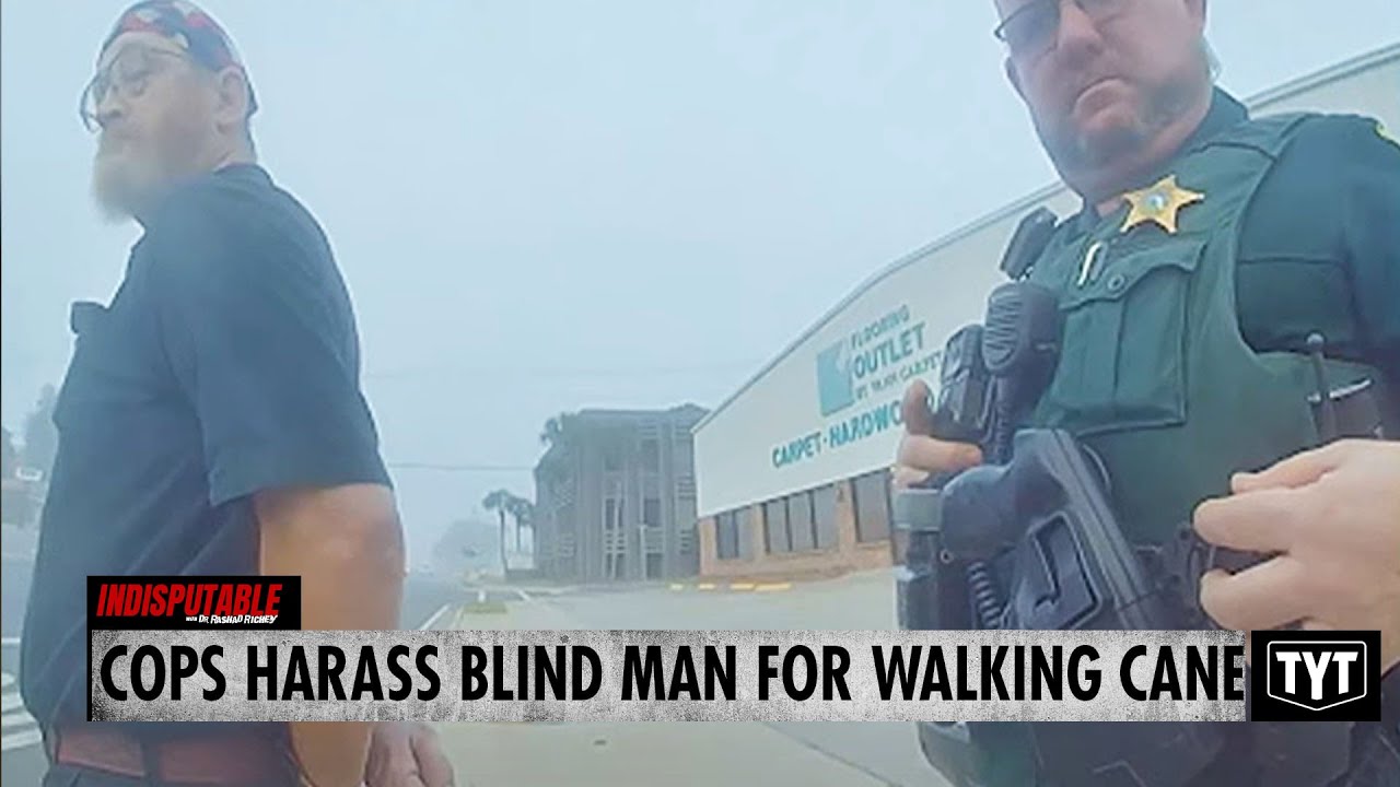 WATCH: Cops Arrest Blind Man After Mistaking Walking Cane For Gun