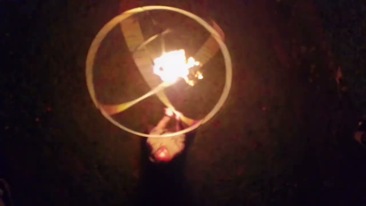 Aerial drone footage of me spinning the fire sphere! 🔥 #fireartist #fireperformer #fireflow #fire 