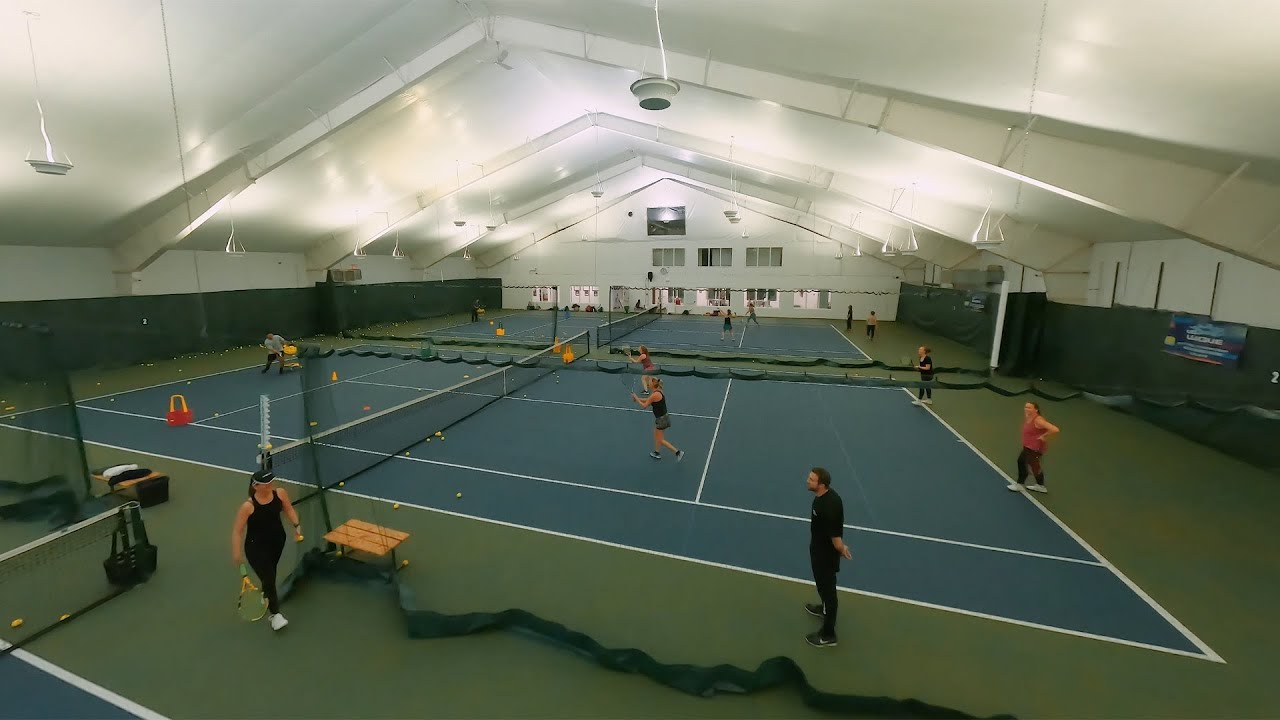 FPV Drone flys through Tennis courts