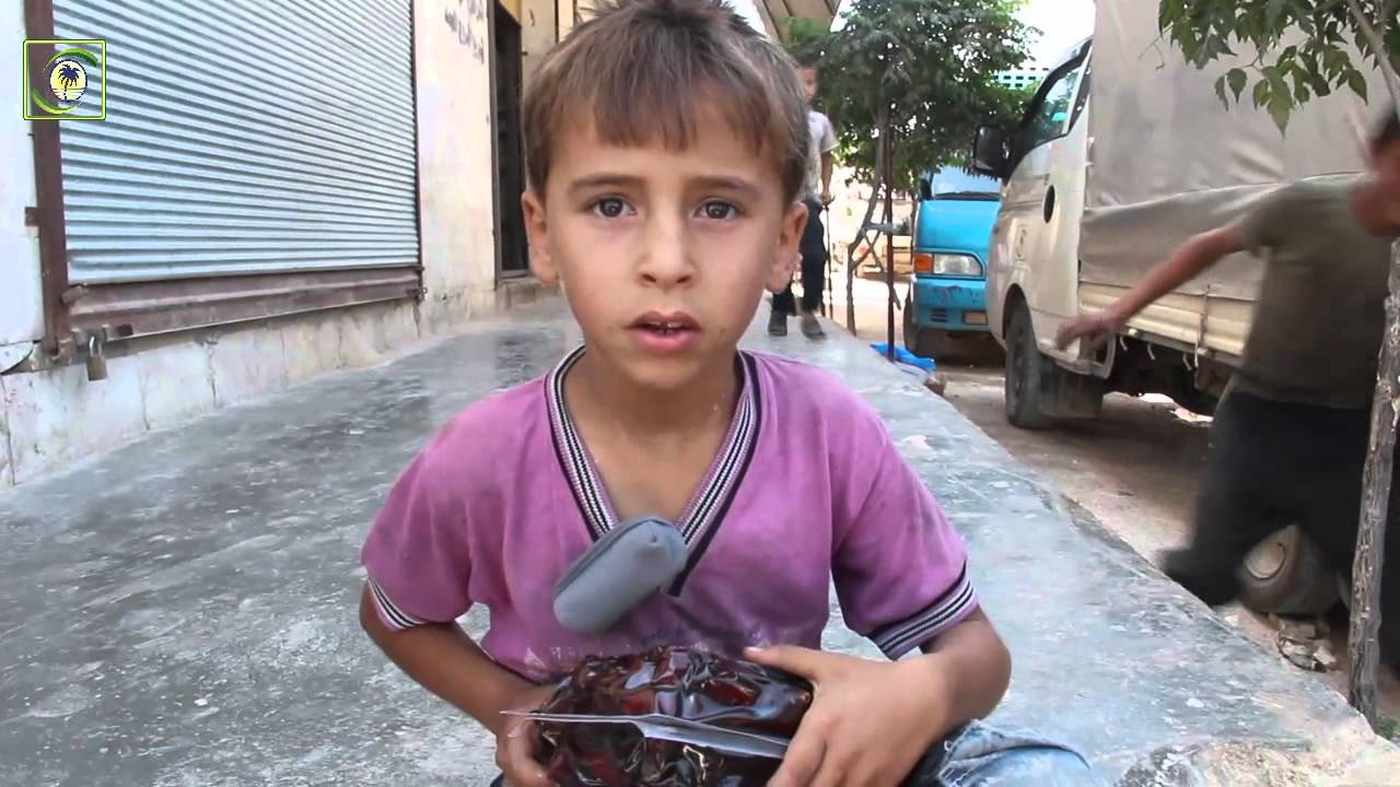 منادي الخير - توزيع التمور على الفقراء والمحتاجين - معردبسة - ادلب - سوريا \6-7-2014