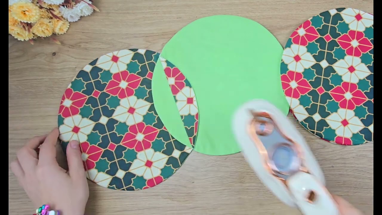 You can make a wonderful placemat by sewing circular fabrics together origami.