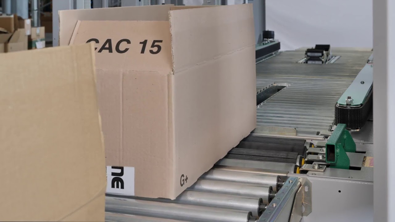 High speed random case sealer for up to 14 boxes/min by COMARME