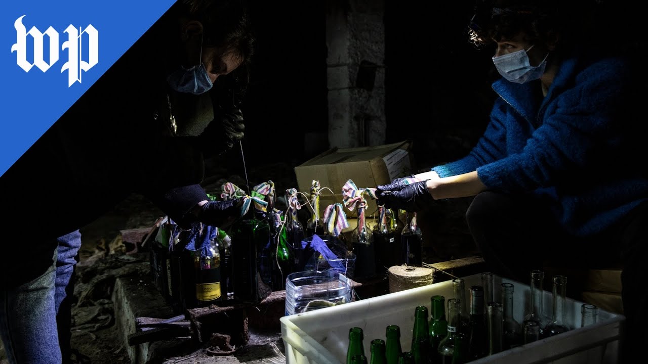 Making Molotov cocktails, lining up for guns: Ukrainians prepare for total war