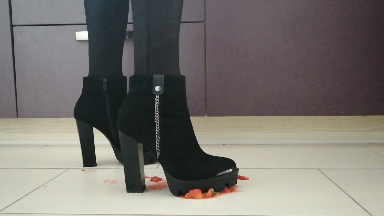 Crushing strawberies with my high heeled lugged sole boots