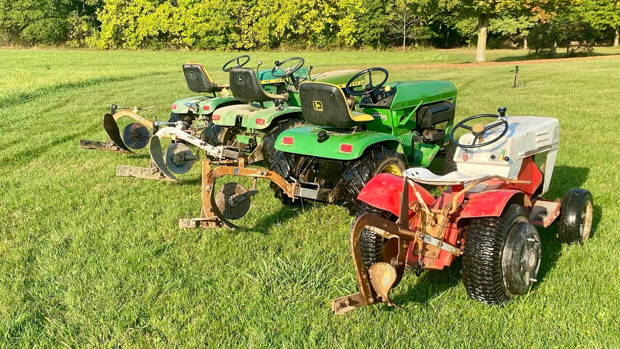 Plowing a garden and dragging logs with the 1971 John Deere 140, 1949 A and 1943 Allis Chalmers WC