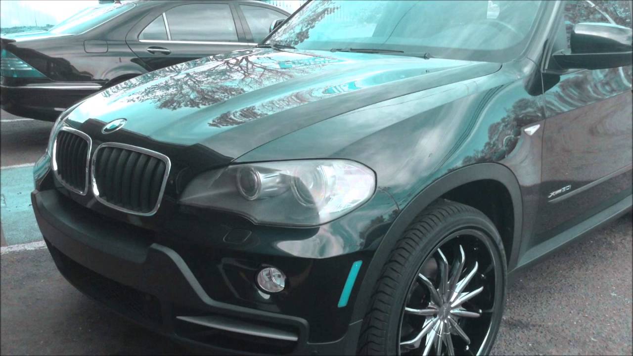 2009 BMW X5 Rolling out Rimtyme of Charlotte sitting on 22'' Milanni Wheels