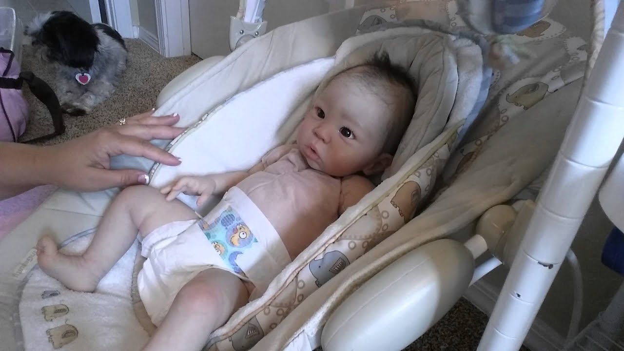 Changing a reborn baby diaper