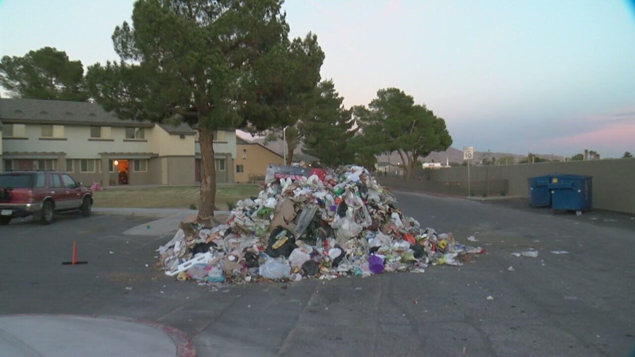 UPDATE: Trash removed after spilled by apartment complex