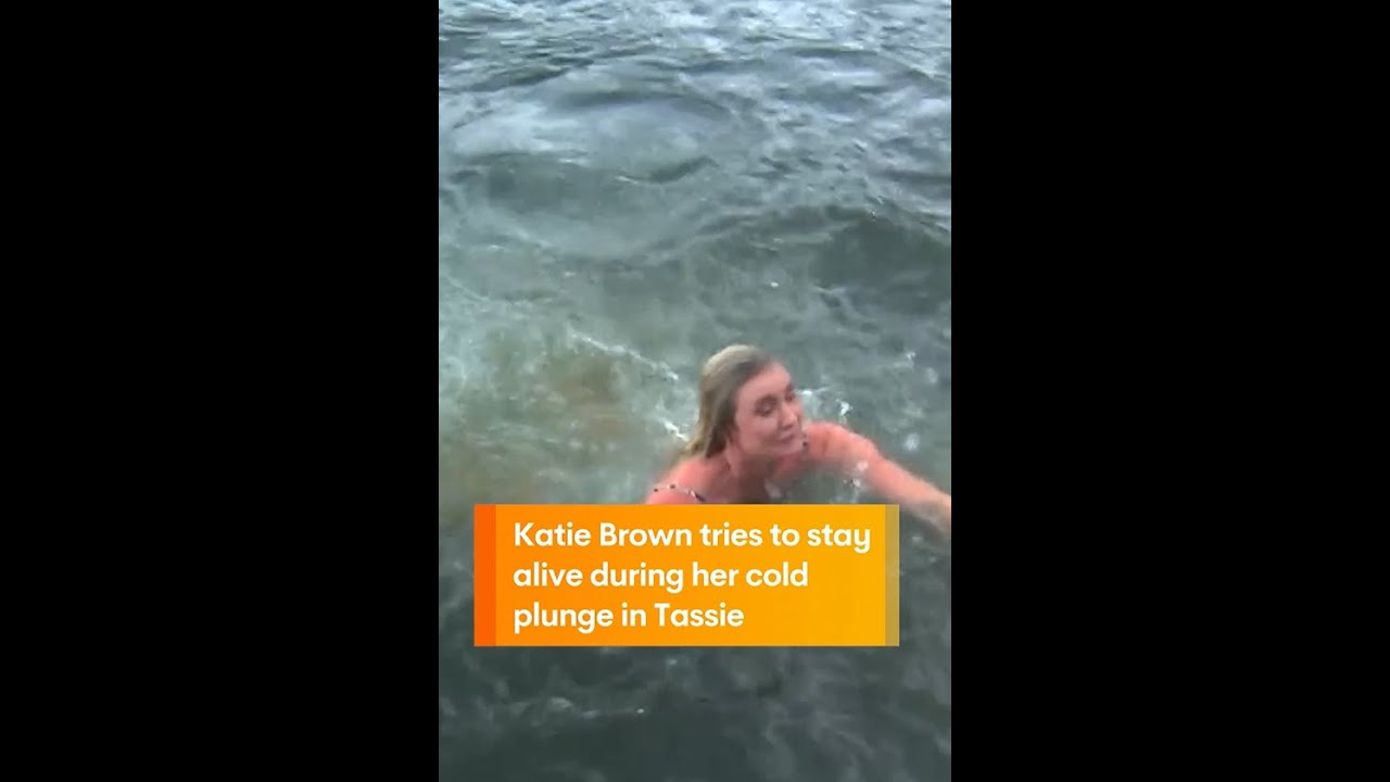 Katie Brown tries to stay alive during her cold plunge in Tassie