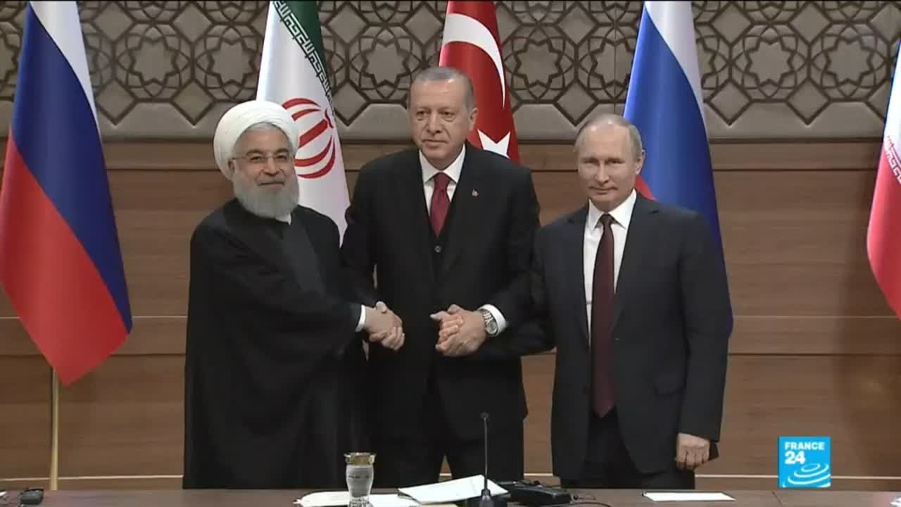 War in Syria: A symbolic handshake between Rouhani, Putin and Erdogan