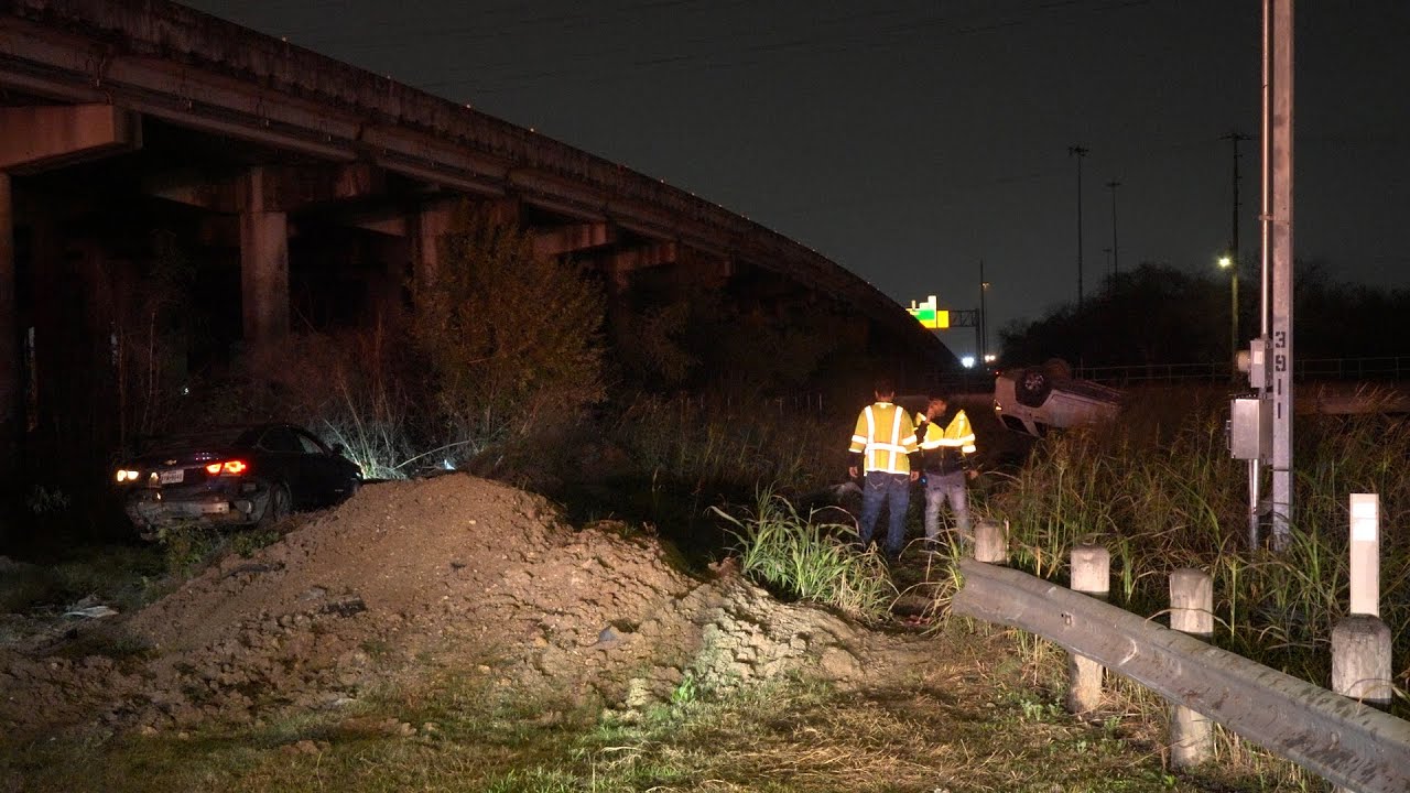 Two vehicles go off road, one flips in crash under North Freeway near Crosstimbers