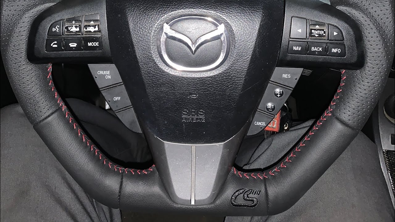installing an corksport steering wheel, on my Mazdaspeed 3 ￼