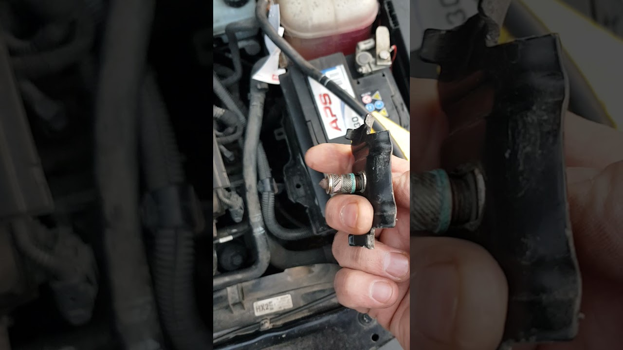 Akumulator,wymiana,zabezpieczenie nie daje sie odkrecic,opel astra h