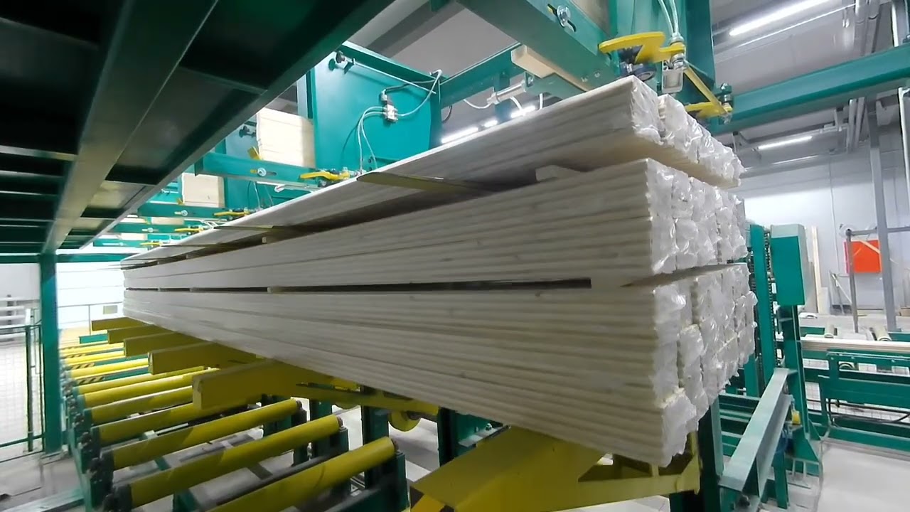 Пакетоформирующая машина для укладки минипакетов со строганной продукцией в транспортный пакет