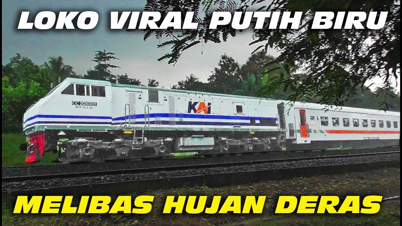 KERETA API PASUNDAN DITARIK LOKOMOTIF  VIRAL CC203  PUTIH BIRU menerjang hujan deras dengan perkasa