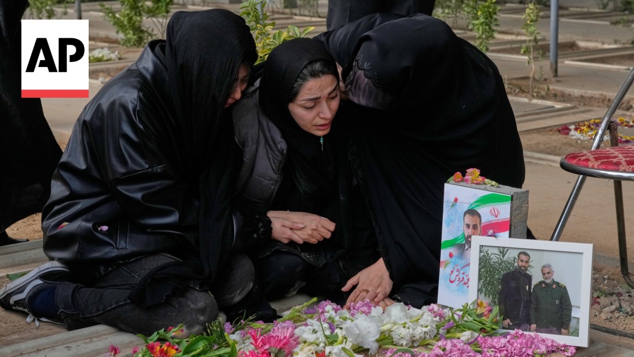 Relatives in Tehran bury those killed by Israel and US strikes