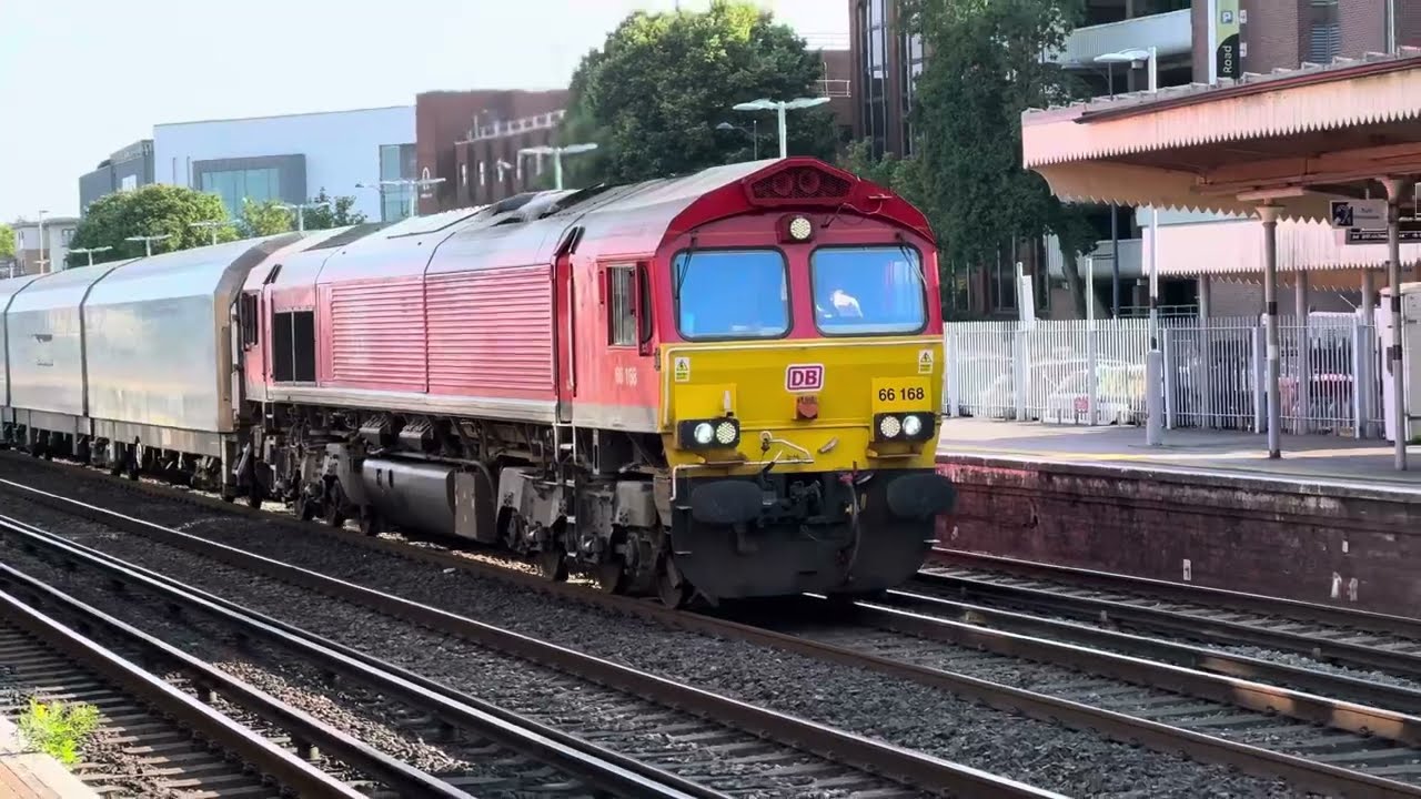 66168 very slowly heads through Eastleigh with the empty BMW Mini car carrier WIA wagons to Oxford