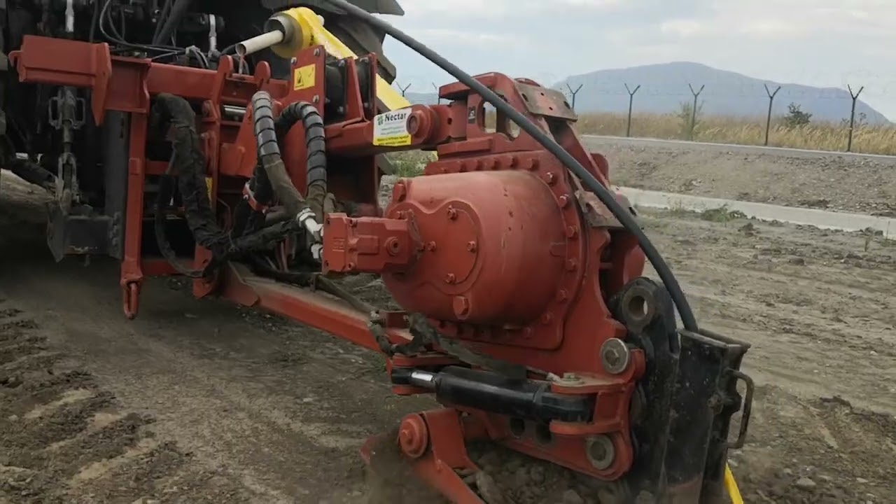 Ditch Witch Plow & Claas Axion 820 C-matic