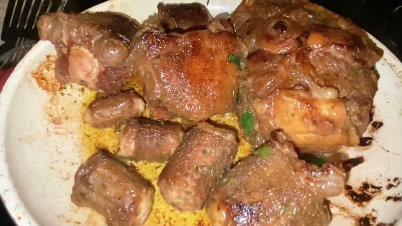 Oxtails and yellow rice and beans 