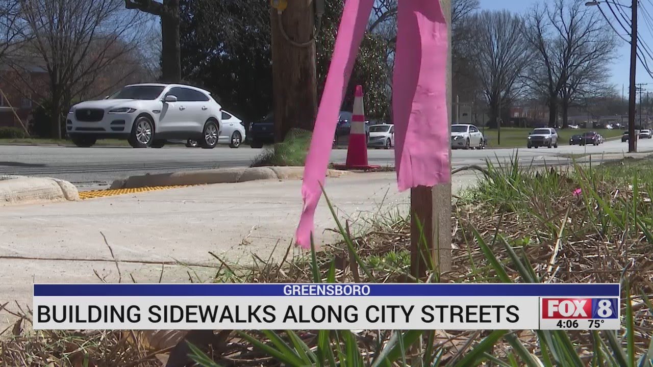 Greensboro building sidewalks along city streets