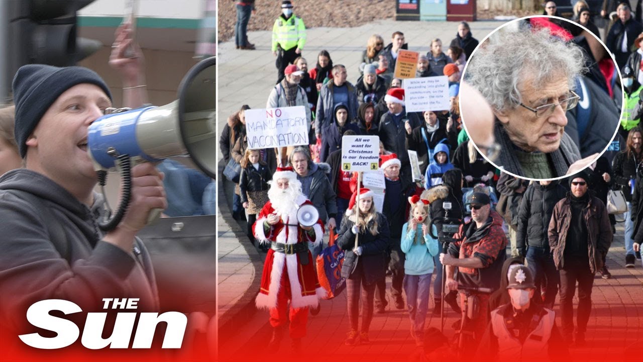Anti-lockdown protesters shout at shoppers to remove their masks as demonstrations hit the UK