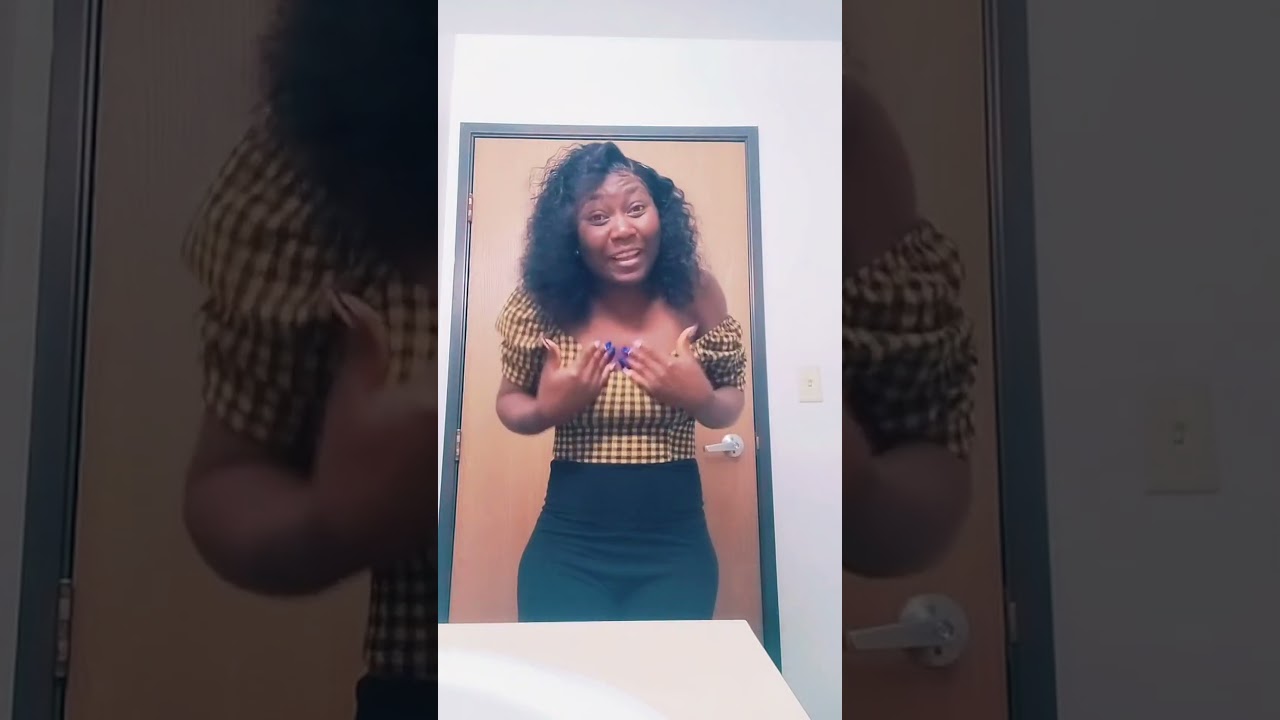 Radiant Woman Expresses Joy in Fashionable Attire#FashionJoy #StyleConfidence