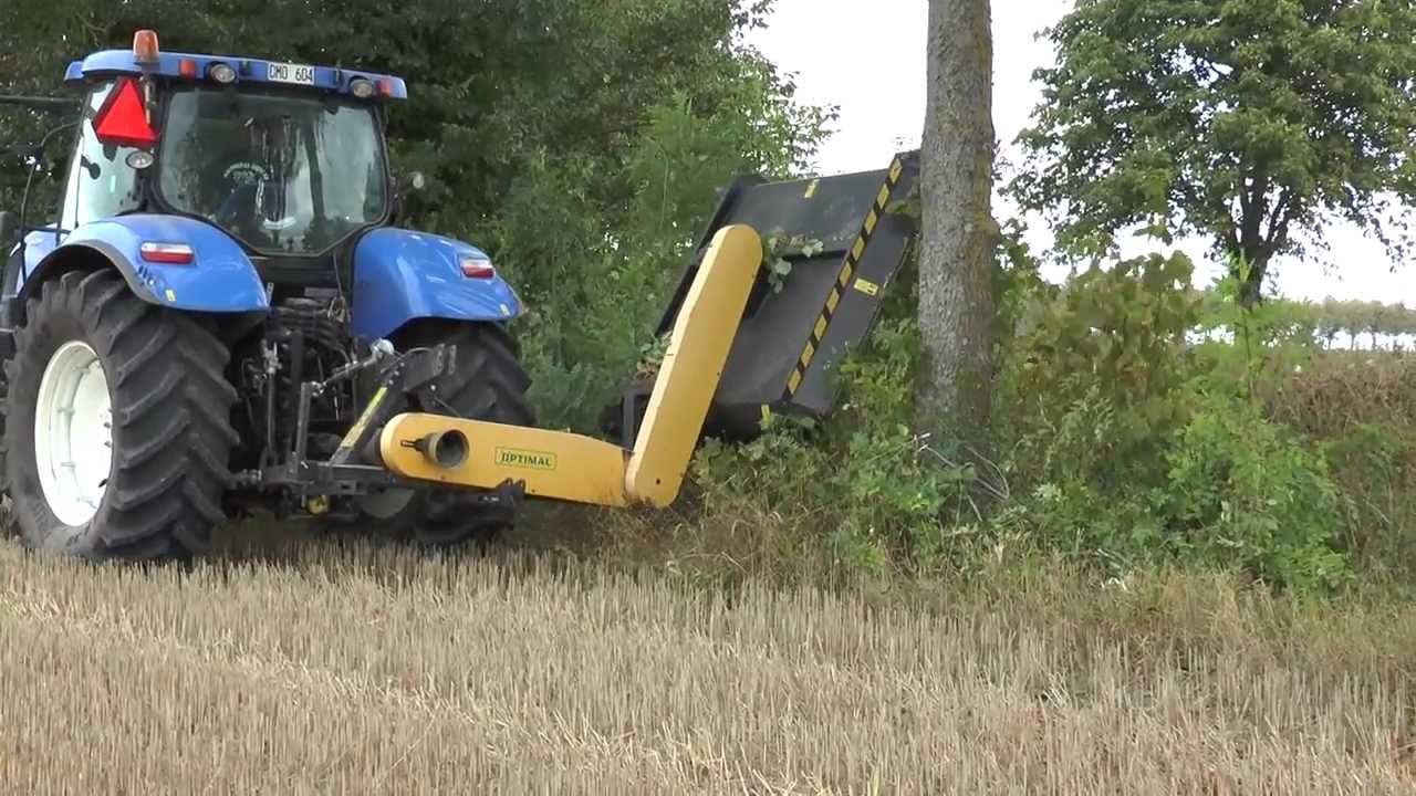 New Holland T7 185 clearing bushes from a ditch with a brush cutter 2013