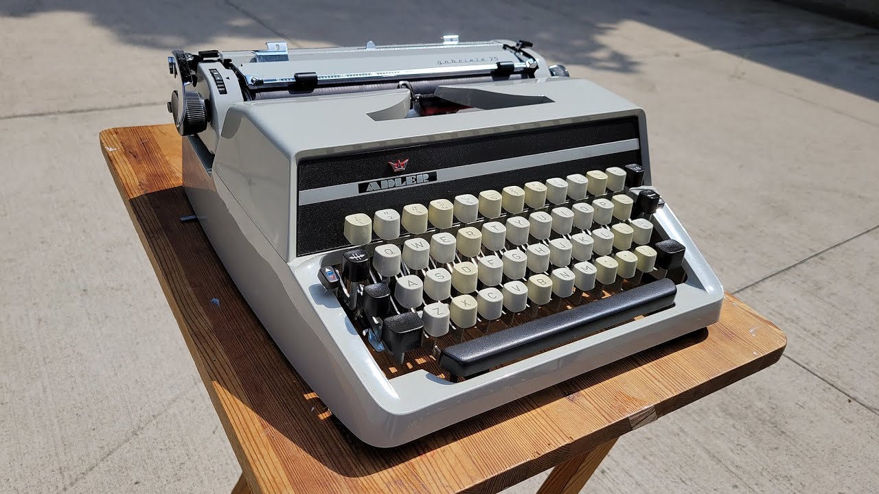 Typing outside on a 1970s Adler Gabriele 25 typewriter