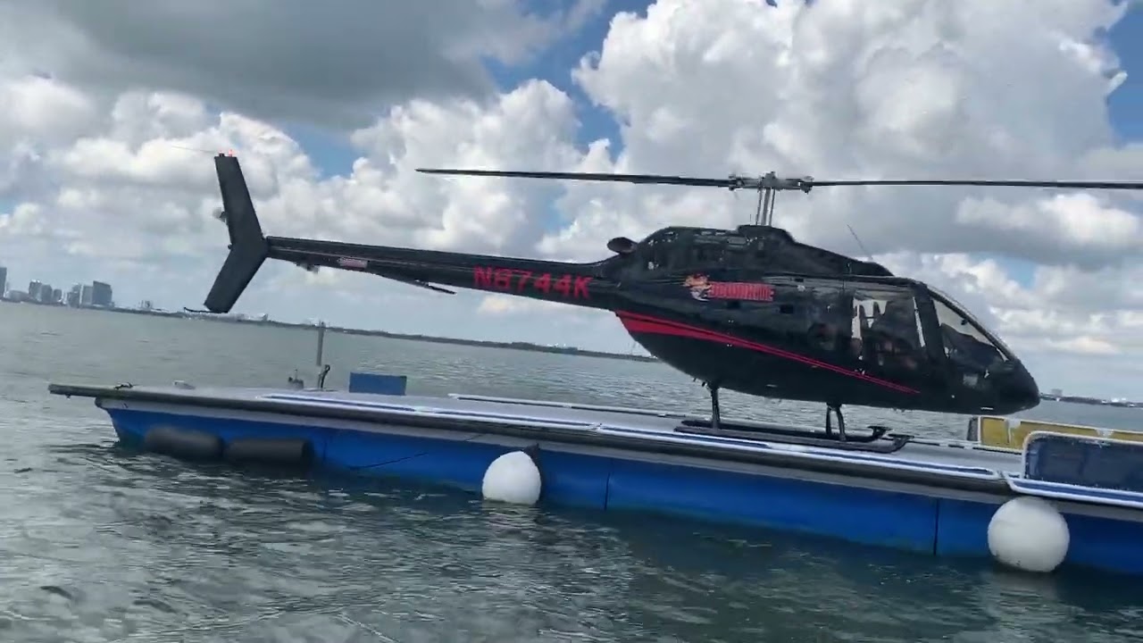 Bell 505 Helicopter landing on Heliboat in the Florida keys