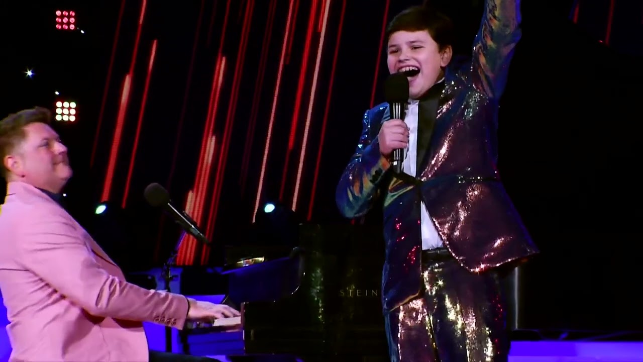 Dylan Demarcus singing with his dad @jaydemarcus5453 at Miss Volunteer America