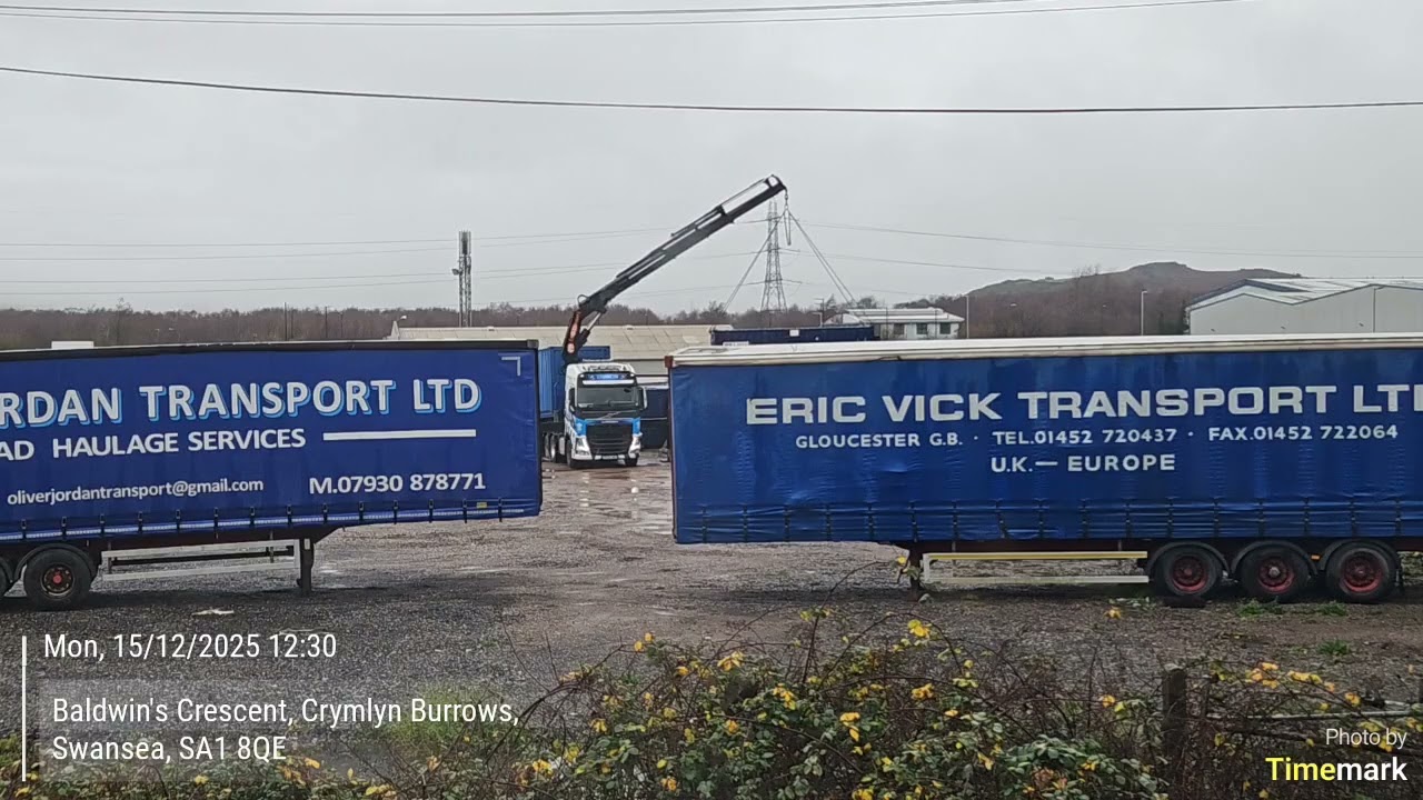 15 December 2025 - Lorry with Crane Delivering Shipping Containers
