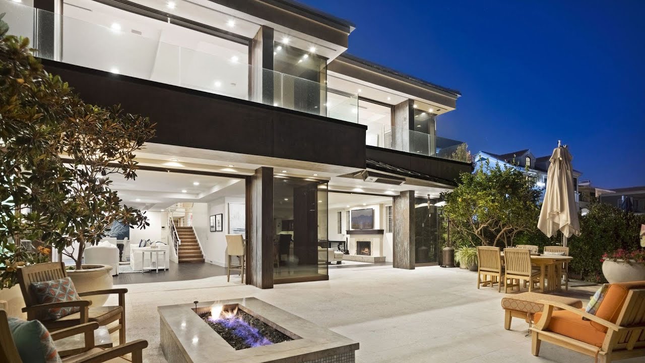 This $15,995,000 Stunning Home in Corona del Mar offers indoor outdoor beach living at its finest