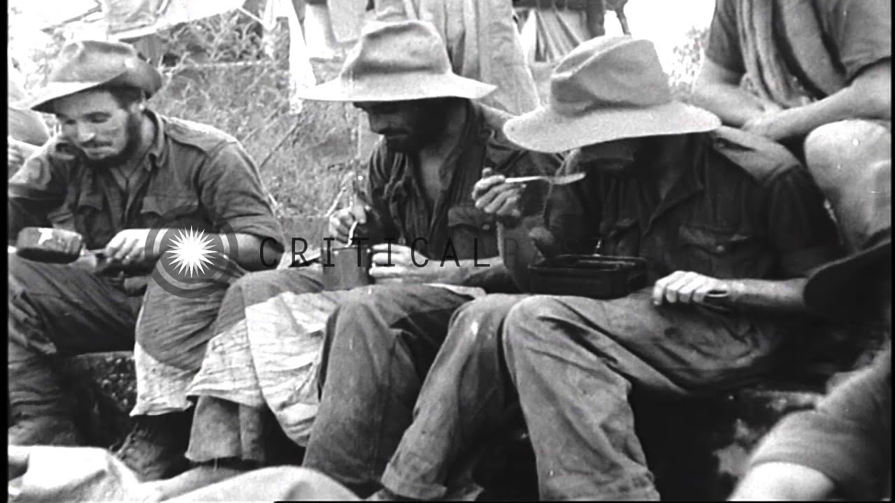 A column of British Army's 'Special Force' Chindits marches through Kamaing, Burm...HD Stock Footage