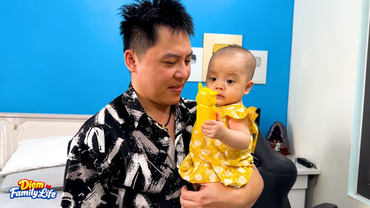 Baby Kim was curious about the gift her dad bought her