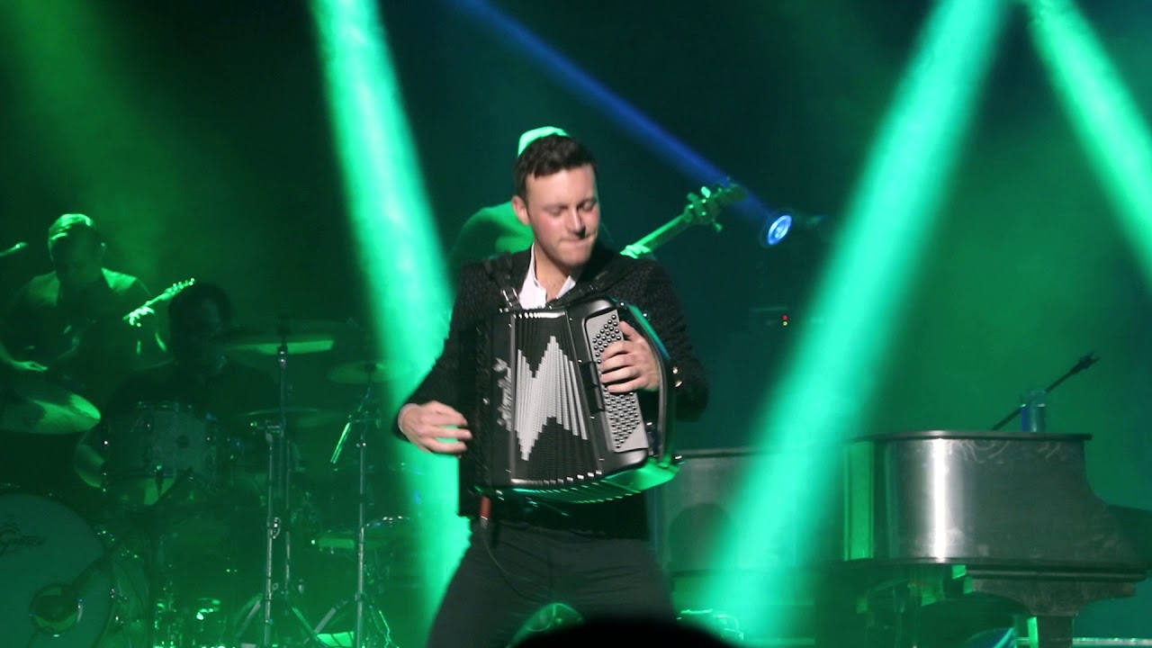 Nathan Carter playing the accordion with his Band - Live - Kings Lynn 2017