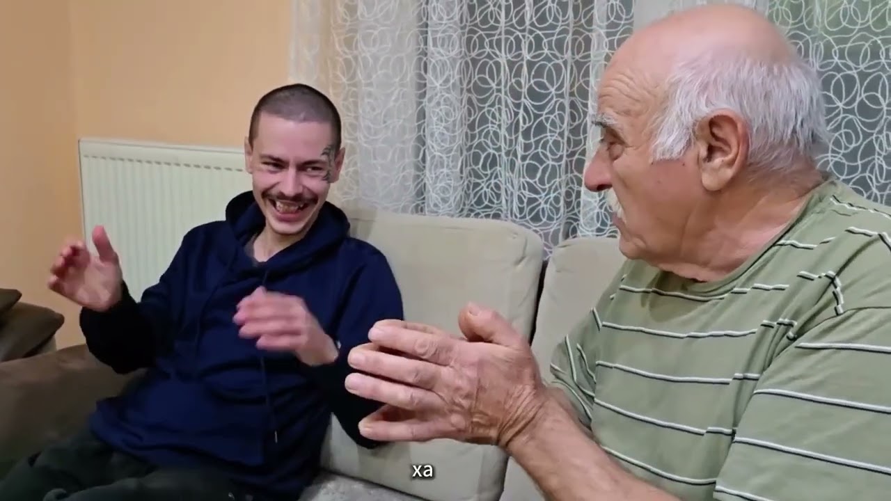 Dragi Crni is sitting with his friend