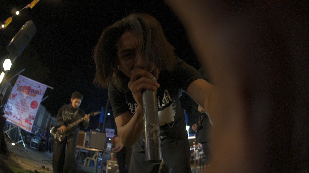 public black metal performance in front of a cathedral