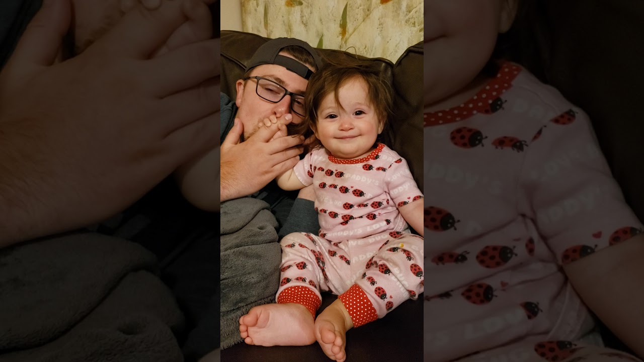 Daddy kisses for Raegan
